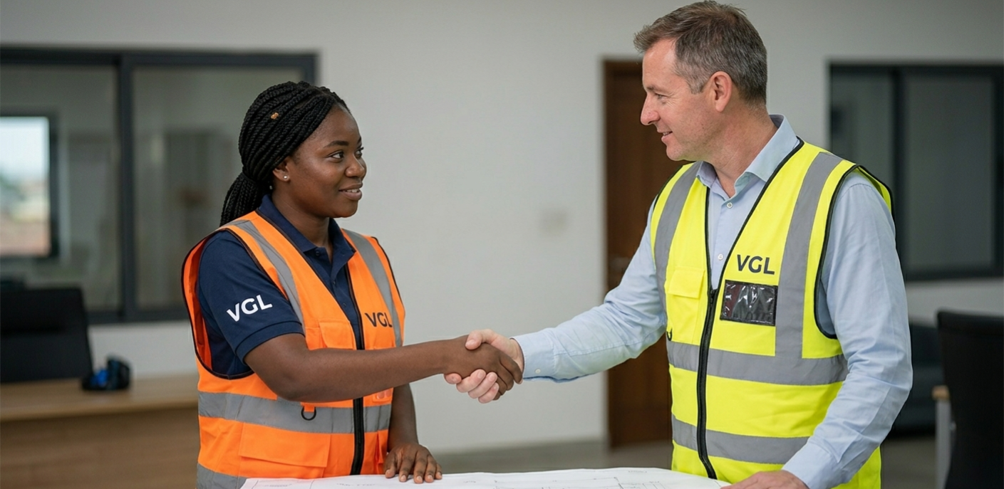 Confident young woman in graduation attire holds diploma outdoors, embodying success.